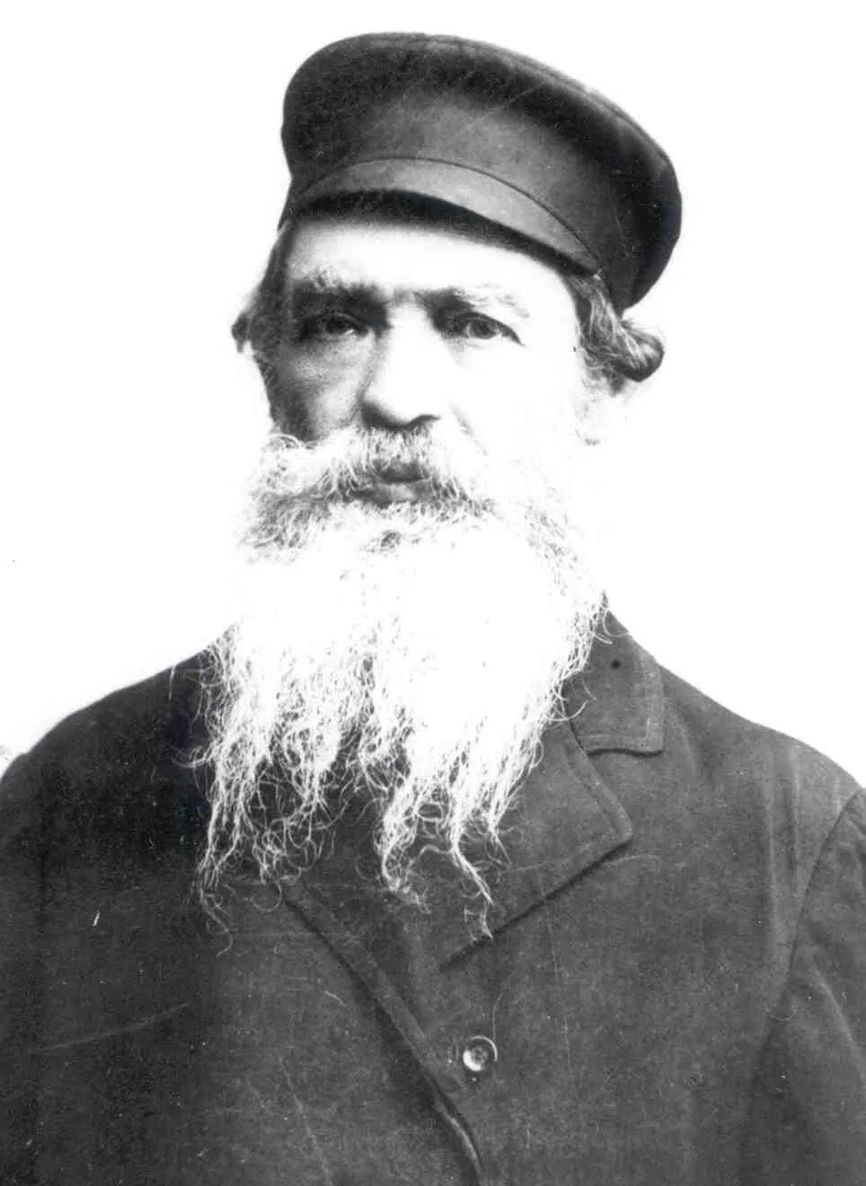 Old portrait of a bearded man in a cap